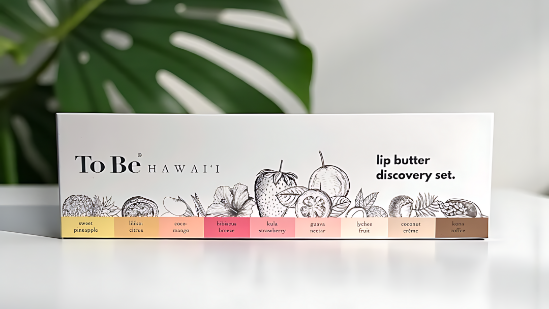 Lip butter discovery set packaging with 'To Be Hawaii' branding on a white background with green leaves.