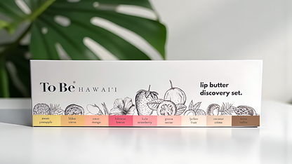 Lip butter discovery set packaging with 'To Be Hawaii' branding on a white background with green leaves.