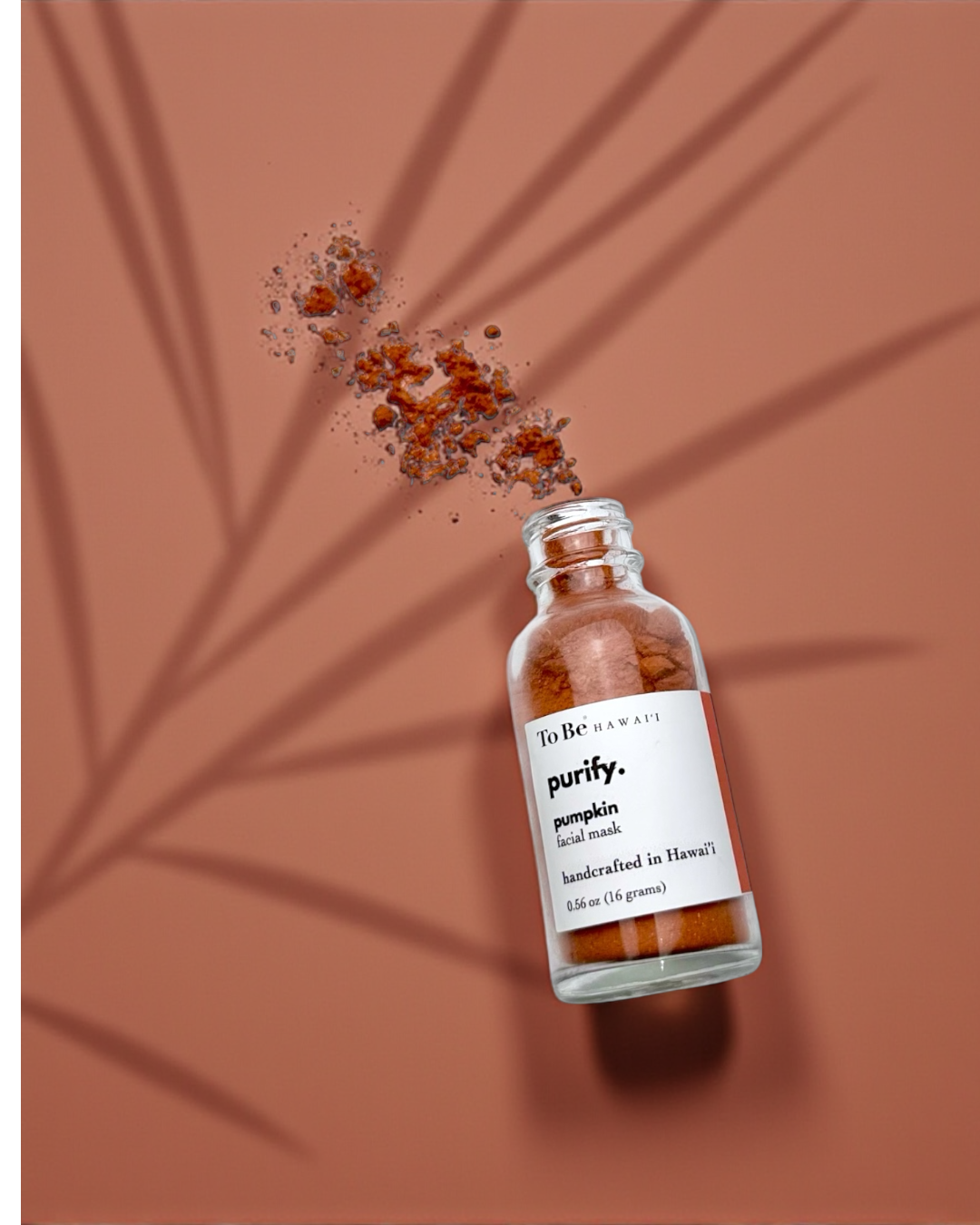 Glass bottle with brown powder labeled 'purify' on a brown background